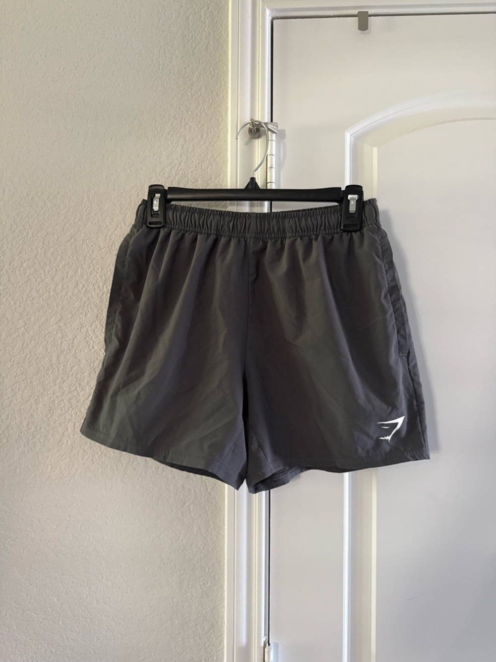 Gymshark women’s Athletic Running Shorts - Charcoal Gray with White Logo